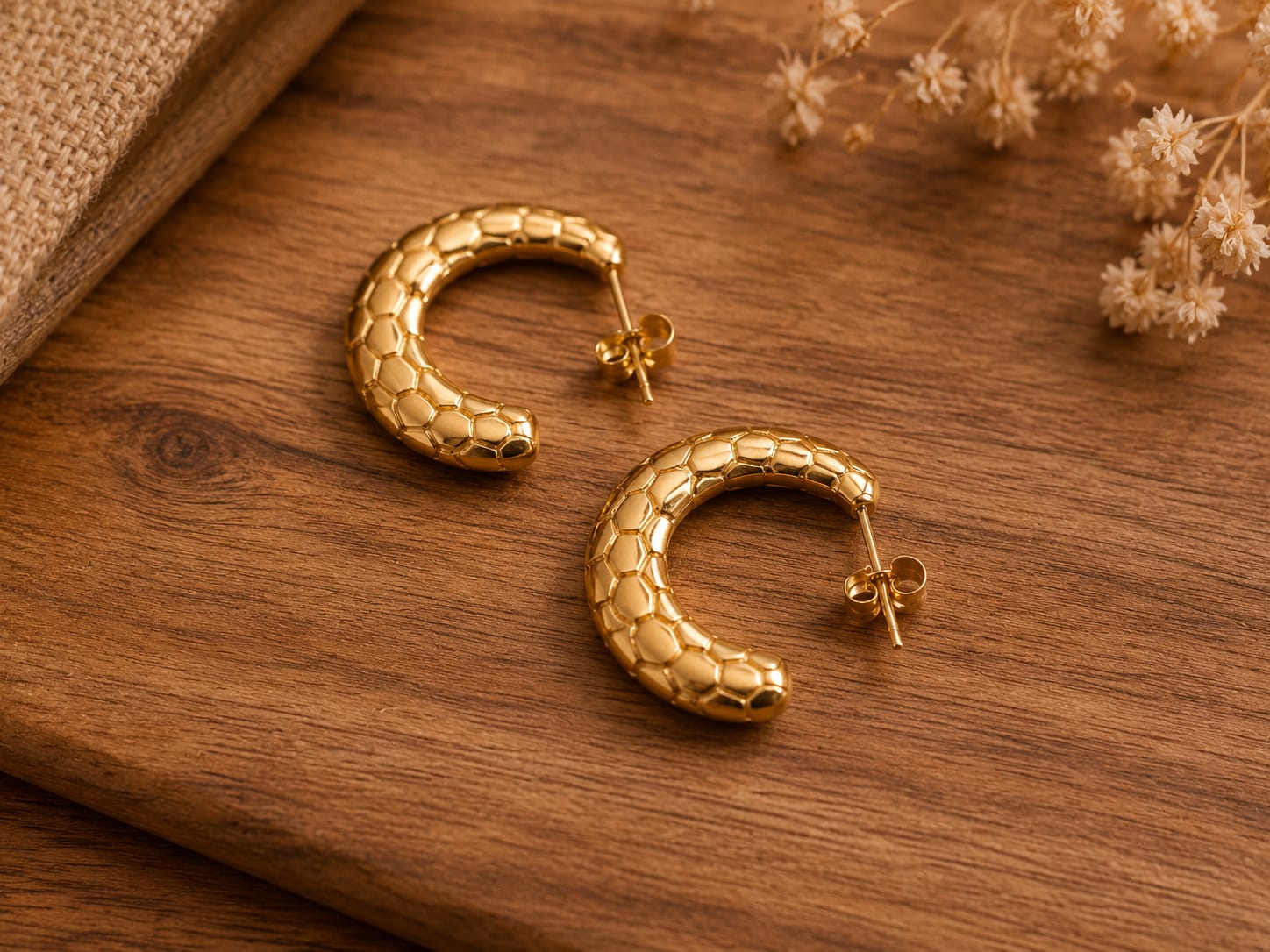 crescent-shaped stud earrings